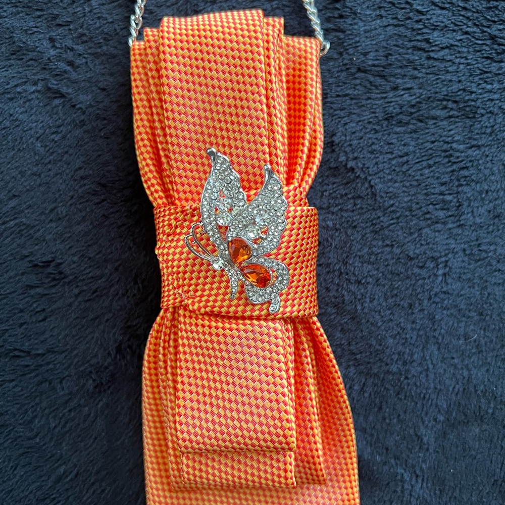 Orange Tie with Butterfly Brooch